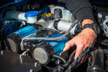 Load image into Gallery viewer, Close-up of the ARB Brushless Twin 12V On-Board Air Compressor Kit CKBLTA12 showcasing its brushless twin-motor design.