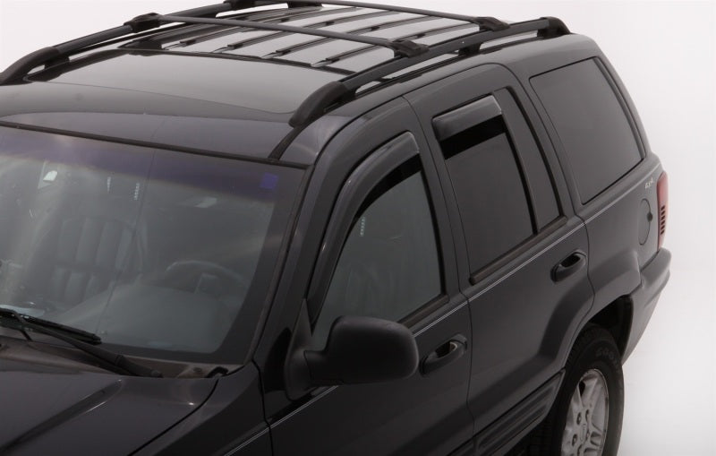 AVS smoke in-channel window deflectors installed on 1999-2004 Jeep Grand Cherokee front and rear doors, 4-piece set