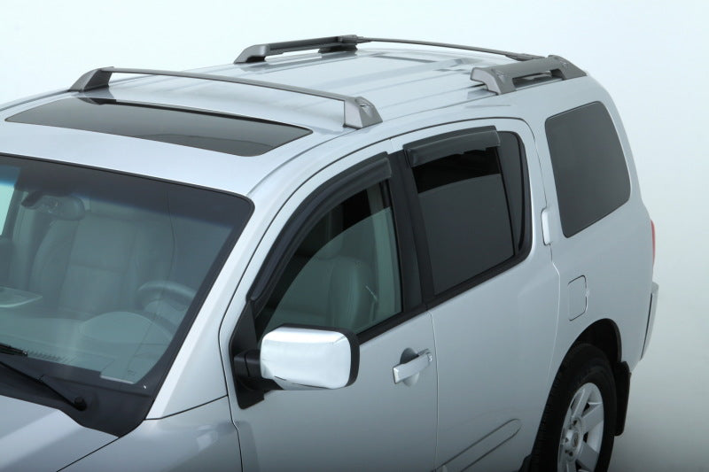 AVS smoke outside-mount window deflectors installed on a 2004-2015 Nissan Armada, 4-piece Ventvisor set