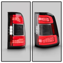 Load image into Gallery viewer, Spyder Apex 19-23 Dodge Ram 1500 (w/ Factory LED) LED Tail Light - Black (ALT-YD-DR19LEDT2-SEQ-BK)