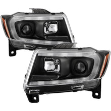 Load image into Gallery viewer, Spyder 11-13 Jeep Grand Cherokee (Xenon/HID Model Only) Light Bar Projector Headlights - Black