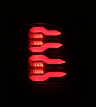 Load image into Gallery viewer, AlphaRex 09-18 Dodge RAM LUXX-Series LED Taillights Black Red w/Actv Light &amp; SS