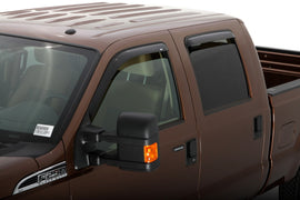 AVS smoke outside mount window deflectors installed on a 1999-2016 Ford F-250 Super Duty Supercab, 4-piece set