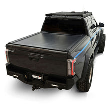 Load image into Gallery viewer, Westin 24-26 Toyota Tacoma 5ft Bed Manual Retractable Tonneau Cover - Black