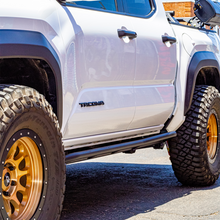 Load image into Gallery viewer, Cali Raised 2024+ Toyota Tacoma Trail Edition Rock Sliders - Double Cab Short Bed / Kick Out / Raw