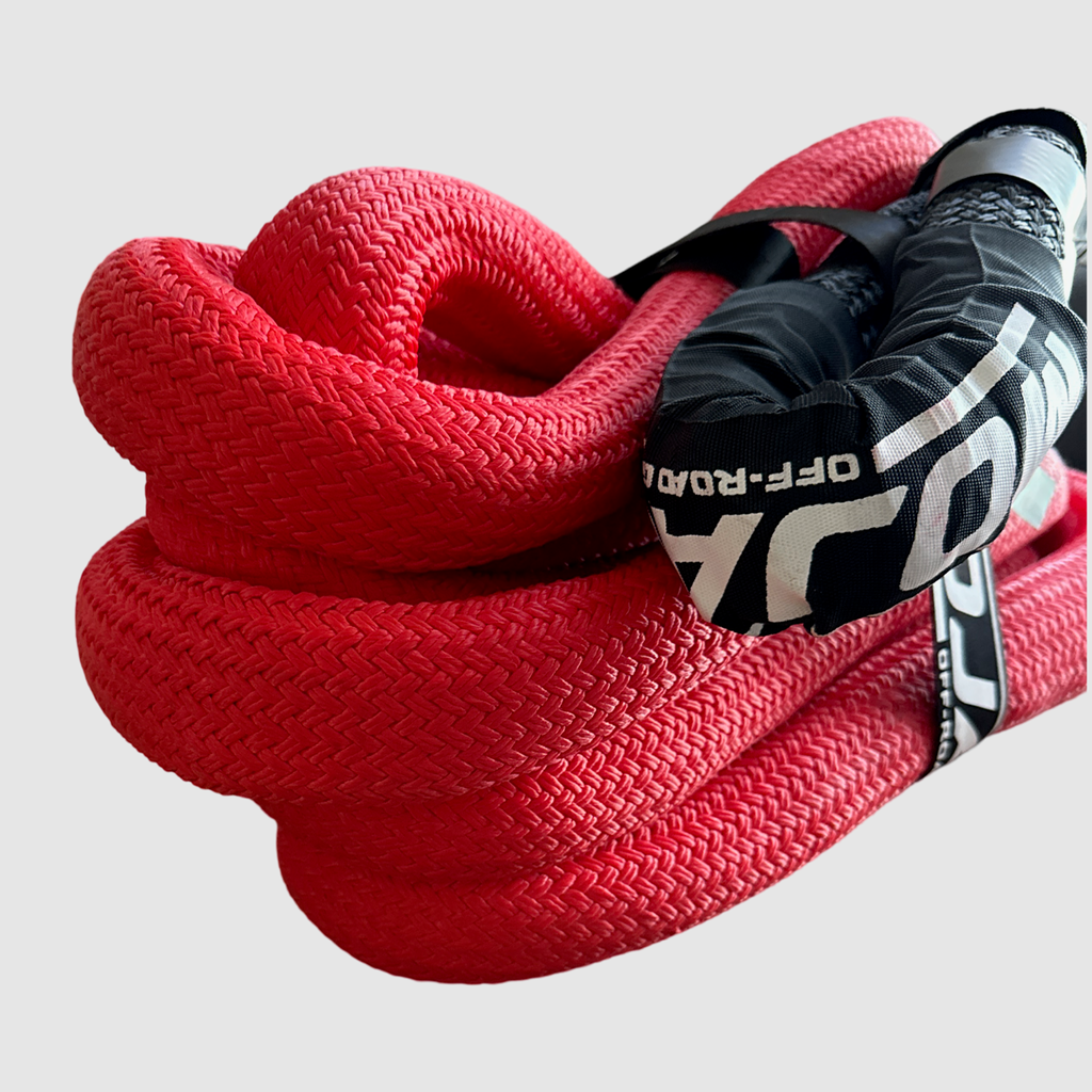 1 1/2” x 30' Kinetic rope displayed in action during a vehicle recovery, demonstrating its 30% stretch capability.