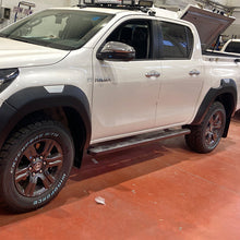 Load image into Gallery viewer, Toyota Hilux Rock Sliders