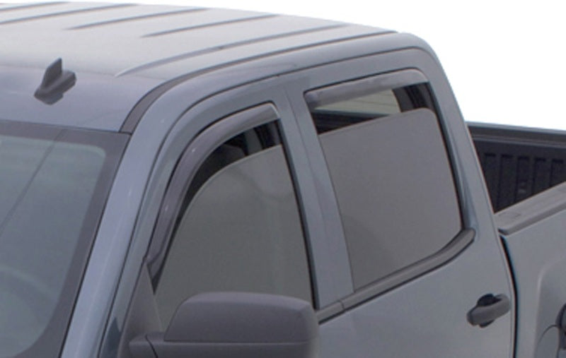 AVS smoke Ventvisor front and rear window deflectors installed on 2015-2018 Chevy Silverado 2500 Extended Cab