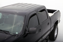 Load image into Gallery viewer, AVS smoke outside-mount Ventvisor window deflectors installed on a 2002-2006 Cadillac Escalade EXT, 4-piece set