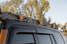 Load image into Gallery viewer, DV8 24-25 Toyota Land Cruiser / GX550 Roof Rack Light Mount (for RRTL4-01)
