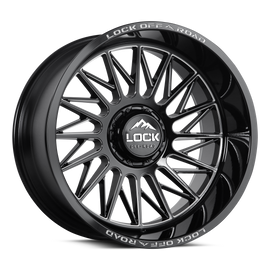 Lock Off-Road ASSAULT wheel in Gloss Black Milled finish with directional spokes and deep lip, shown for lifted truck fitment