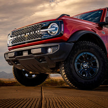 Load image into Gallery viewer, Mounting brackets from the Gen 6 Bronco Plug N Play Fog Kit ready for installation.