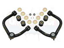 Load image into Gallery viewer, Close-up of the King 2.5" body shocks included in the 10+ Toyota 4runner lift kit, designed for expert-level suspension control.