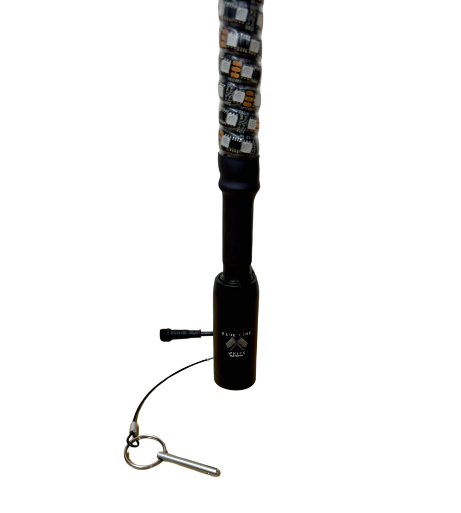 3FT Ultra Bright LED Whip lighting up a side-by-side vehicle in a rugged environment.
