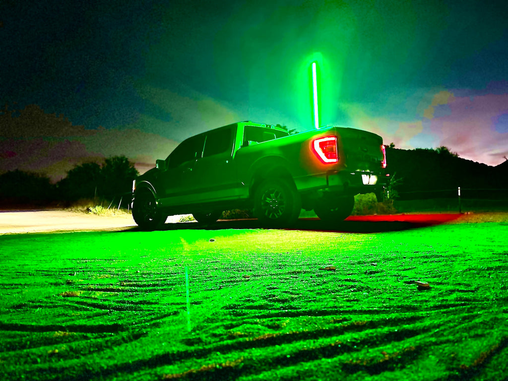 The 4FT Ultra Bright LED Whip controlled via smartphone showing Bluetooth functionality.