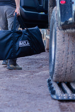 Load image into Gallery viewer, Ultimate Traction recovery board with steel plugs and storage bag