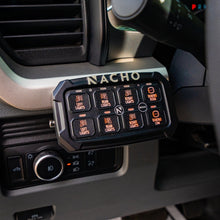 Load image into Gallery viewer, Installation setup of the NACHO Switch System in an off-road vehicle, highlighting rugged durability.