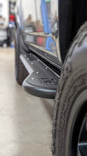 Load image into Gallery viewer, D2 Off-Road 2010-2024 Toyota 4Runner Rock Sliders - Heavy-Duty Bolt-On mounted on a 4Runner showcasing rugged off-road capability.