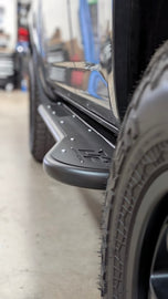 D2 Off-Road 2010-2024 Toyota 4Runner Rock Sliders - Heavy-Duty Bolt-On mounted on a 4Runner showcasing rugged off-road capability.