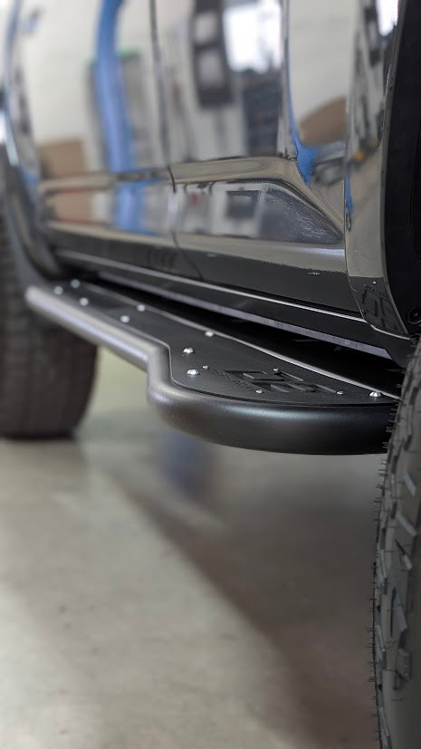 Close-up of D2 Off-Road 2010-2024 Toyota 4Runner Rock Sliders - Heavy-Duty Bolt-On highlighting durable steel construction.
