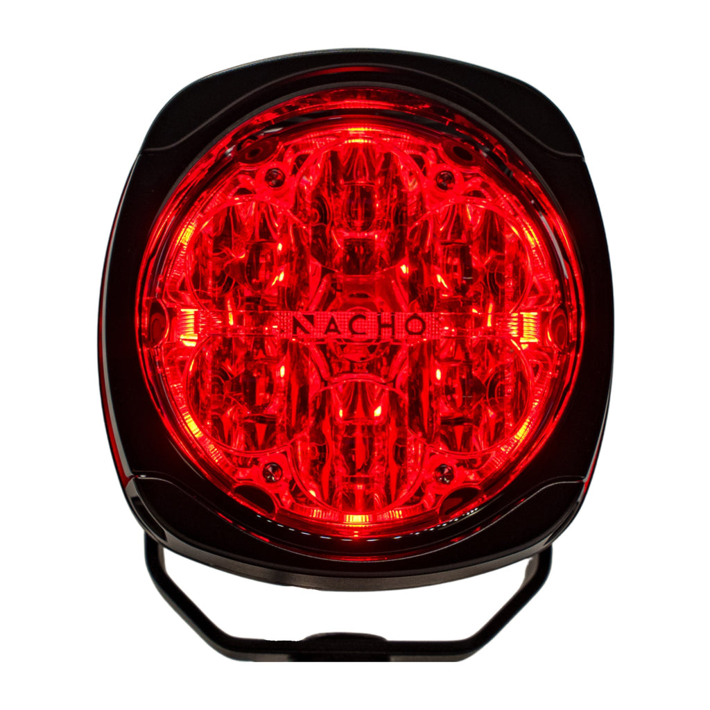 A group of NACHO Quatro Chase lights enhancing safety during off-road travel.