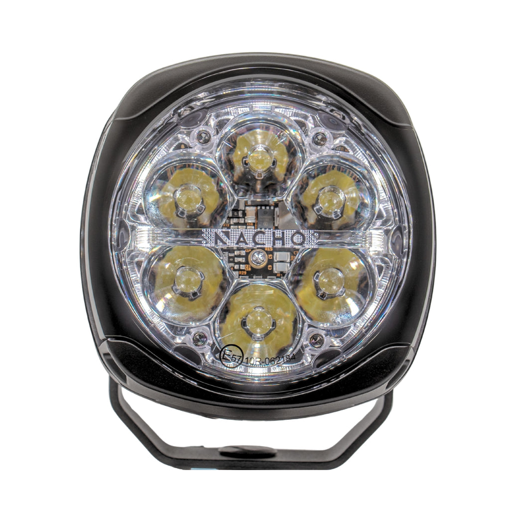 NACHO Quatro Off-Road light in a rugged outdoor setting emphasizing its versatility.