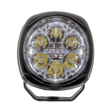 Load image into Gallery viewer, NACHO Quatro Off-Road light in a rugged outdoor setting emphasizing its versatility.