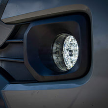 Load image into Gallery viewer, Side view of the Toyota SAE Plug N Play Fog Kit installed, showcasing its OEM fitment.