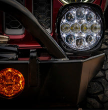 Load image into Gallery viewer, NACHO Grande - Showcase of light intensity between different settings of the 6.75" Multi-Mode LED.
