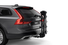 Load image into Gallery viewer, Thule Apex XT 4 - Hanging Hitch Bike Rack w/HitchSwitch Tilt-Down (Up to 4 Bikes) - Black