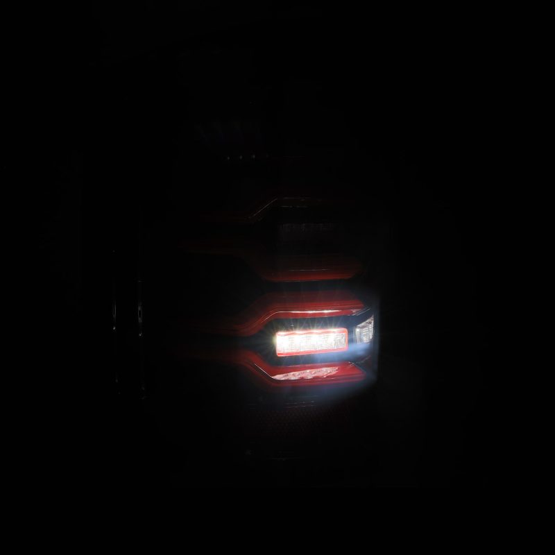 AlphaRex 14-18 Chevy Silverado 1500 Luxx-Series LED Tail Lights Black/Red w/Activ Light/Seq Signal