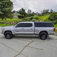 Load image into Gallery viewer, Westin 16-23 Toyota Tacoma 6ft. Bed EXP Truck Cap Black - Box 1 (Box 2 Required 16-14185B)