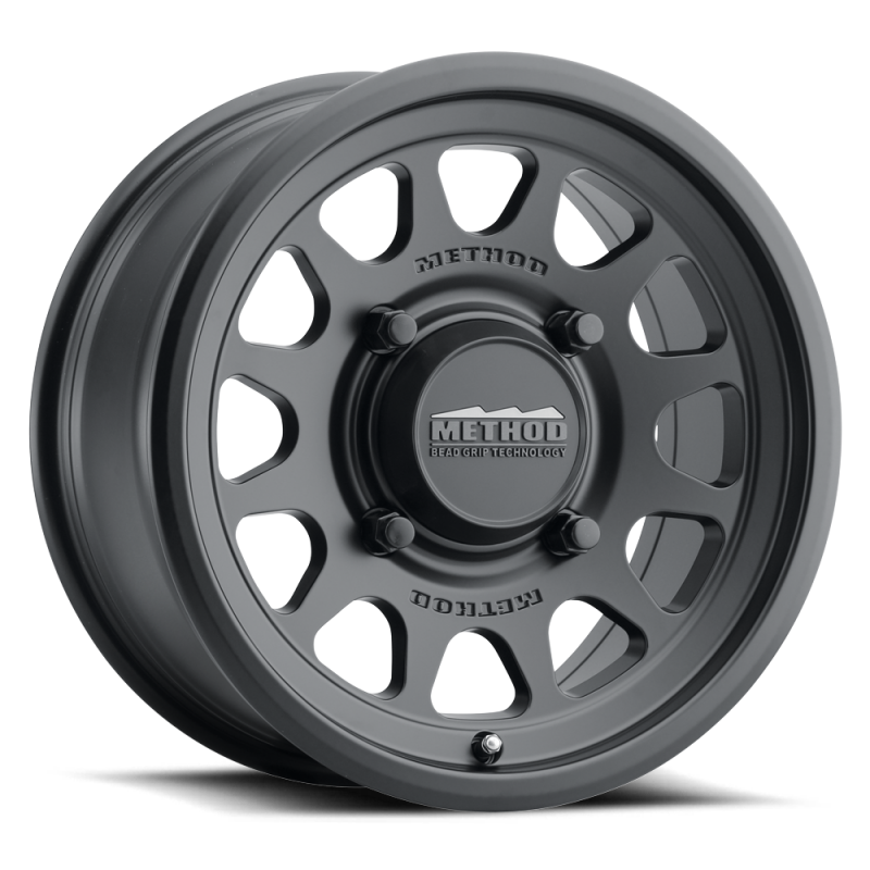 Method MR414 Bead Grip 14x7 / 5+2/38mm Offset / 4x136 / 106mm CB Matte Black Wheel