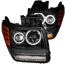 Load image into Gallery viewer, ANZO 2007-2012 Dodge Nitro Projector Headlights w/ Halo Black (CCFL) G2