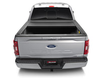 Load image into Gallery viewer, Roll-N-Lock 15-17 Ford F-150 77-3/8in E-Series Retractable Tonneau Cover