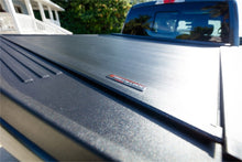 Load image into Gallery viewer, Roll-N-Lock 09-14 Ford F-150 67in E-Series Retractable Tonneau Cover