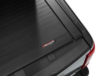 Load image into Gallery viewer, Roll-N-Lock 15-17 Ford F-150 77-3/8in E-Series Retractable Tonneau Cover