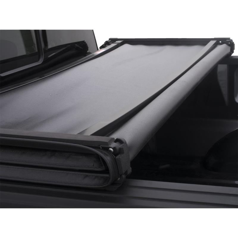 Lund 04-15 Nissan Titan (6.5ft. Bed w/o Utility TRack) Genesis Tri-Fold Tonneau Cover - Black