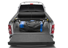 Load image into Gallery viewer, Roll-N-Lock 15-18 Ford F-150 LB 96in Cargo Manager