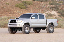 Load image into Gallery viewer, Fabtech 05-14 Toyota Tacoma 4WD/ 2WD 6 Lug Models Only 6in Basic Sys w/Perf Shks