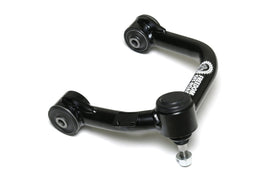 Freedom Off-Road upper control arms installed on a lifted Toyota Tacoma 2005–2023