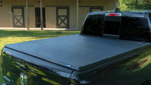 Load image into Gallery viewer, Lund 07-13 Chevy Silverado 1500 (8ft. Bed) Genesis Tri-Fold Tonneau Cover - Black
