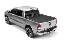 Load image into Gallery viewer, Roll-N-Lock 19-23 RAM 1500 w/o Swing Gate Tailgate SB 76.3in M-Series Retractable Tonneau Cover