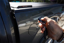 Load image into Gallery viewer, Roll-N-Lock 10-17 Dodge Ram 1500 - 3500 76in E-Series Retractable Tonneau Cover