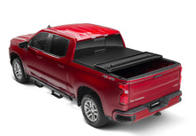 Load image into Gallery viewer, Lund 07-13 Toyota Tundra Fleetside (5.5ft. Bed) Hard Fold Tonneau Cover - Black