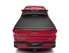 Load image into Gallery viewer, Lund 07-13 Toyota Tundra Fleetside (6.5ft. Bed) Hard Fold Tonneau Cover - Black