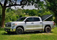 Load image into Gallery viewer, UnderCover 05-15 Toyota Tacoma 6ft SE Bed Cover - Black Textured (Req Factory Deck Rails)